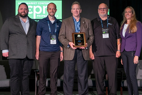 NTN Automotive Aftermarket Catalog Team, Josh Osinski, Mark Richardson, Tim Somes (middle three), Accepting ACPN Award